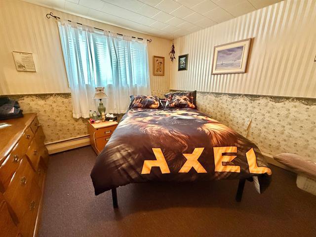 Chambre à coucher : Appartement 114