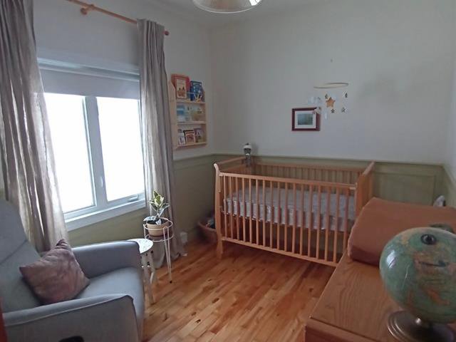 Chambre à coucher : Appartement du rez-de-chaussée