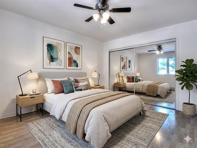 Chambre à coucher principale : Photo modifié par l'IA Staging