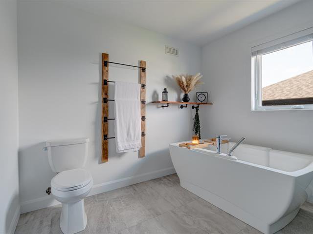 Salle de bains : Bain porteur