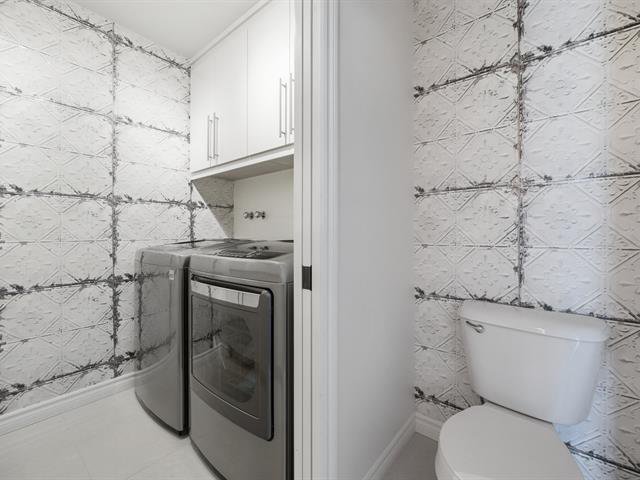 Washroom and adjoining laundry room