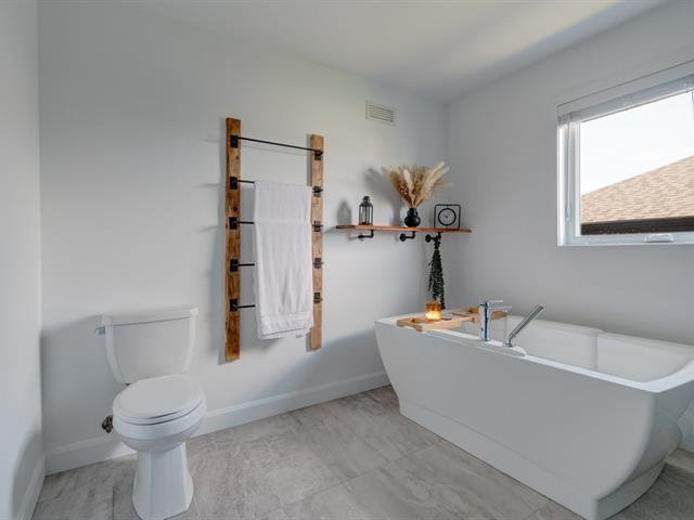 Salle de bains : Bain porteur